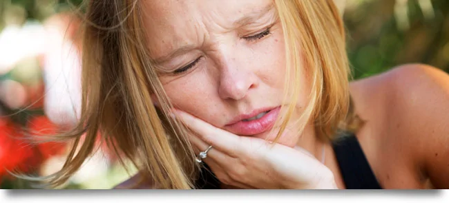 New Port Richey patient experiencing tooth pain decided to seek help for her toothache in Palm Harbor.” width=